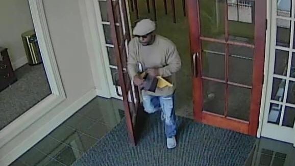 Spartanburg police are working to identify a man accused of robbing a bank Friday.