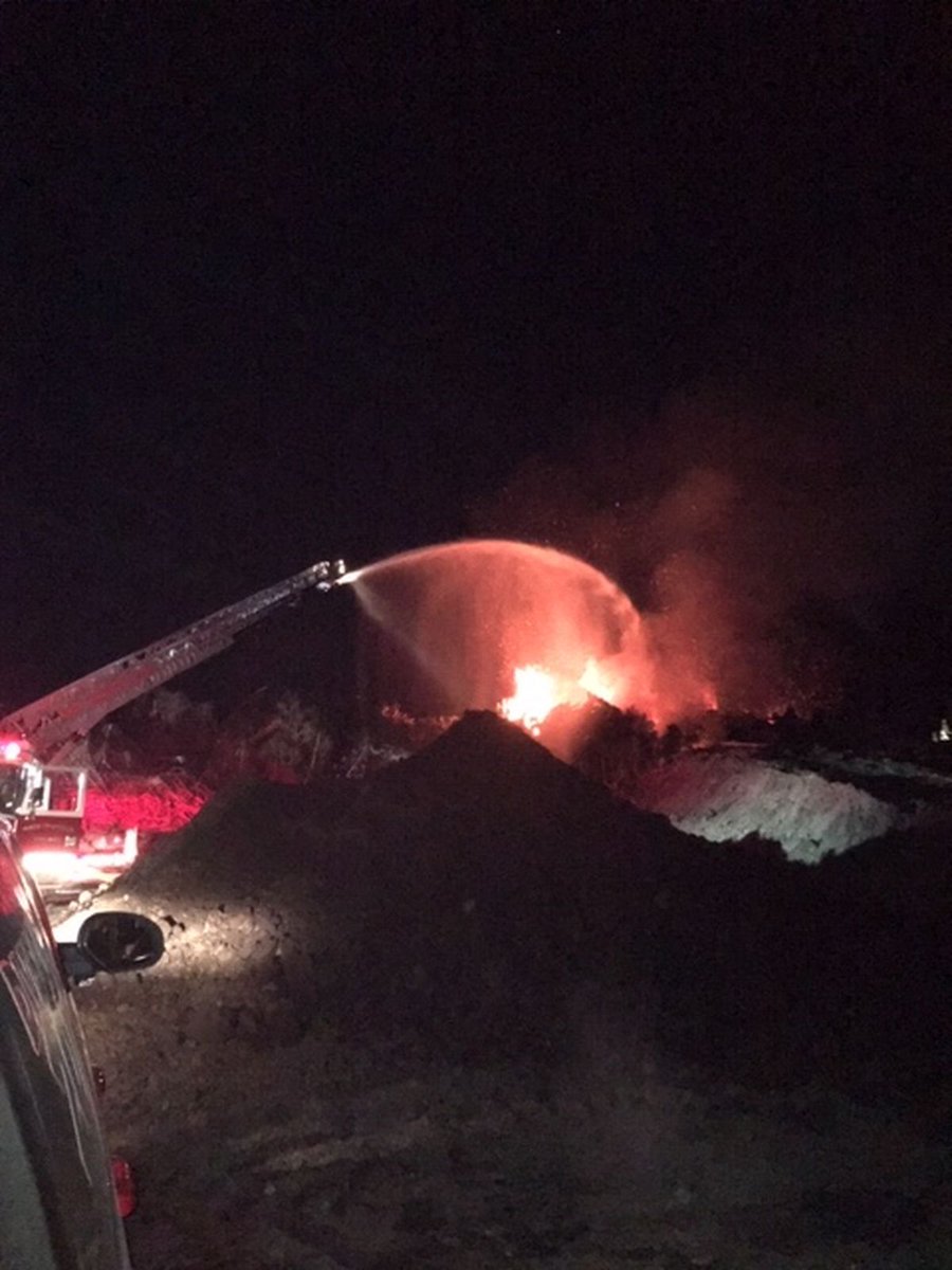 Crews are battling a large mulch fire at a recycling business in Ladson.
