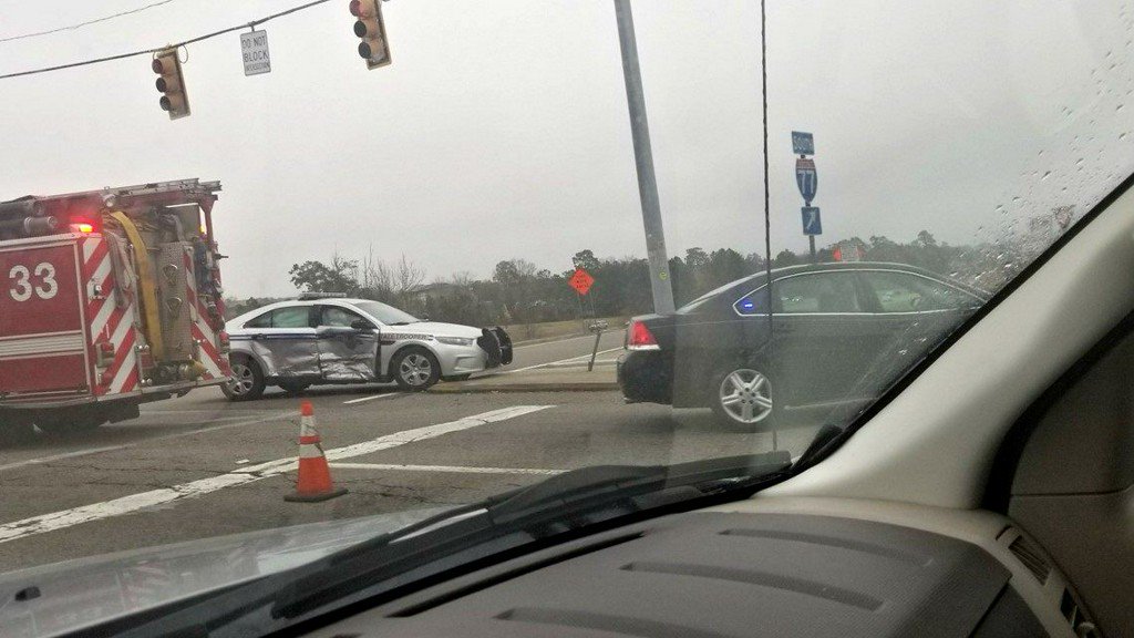 No injuries are reported after a trooper-involved accident briefly backed up traffic on Forest Drive