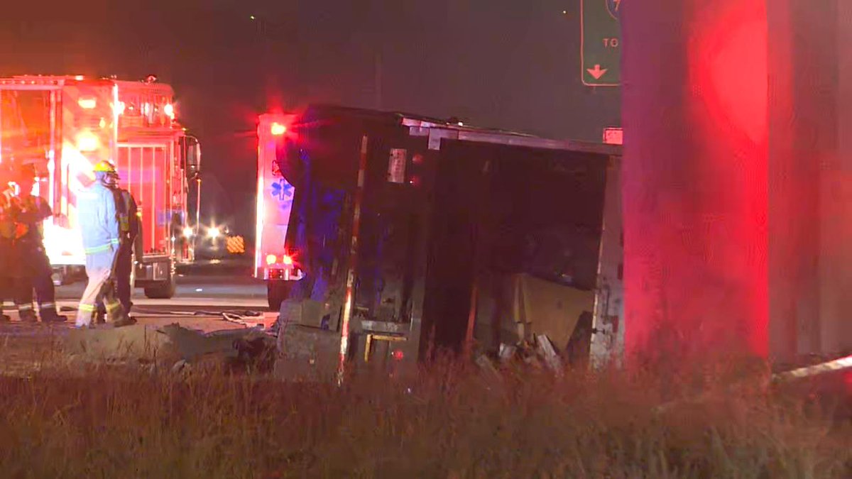 18 wheeler overturned on I-77 at exit 19 and is spilling fuel