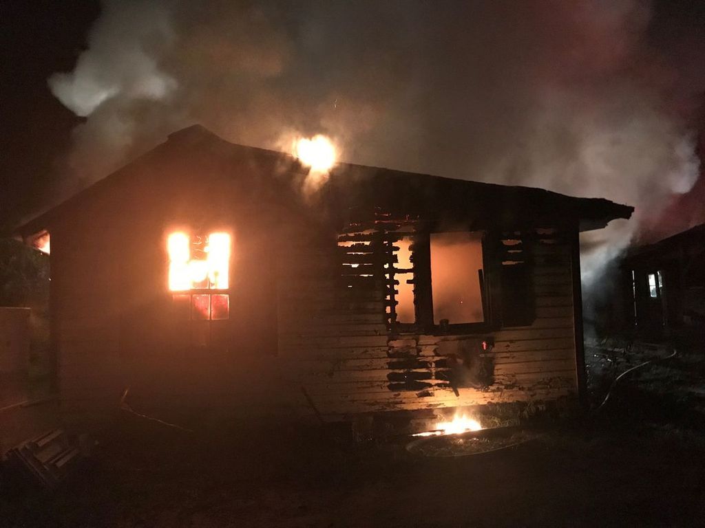 The house was fully engulfed in flames when firefighters arrived at the scene   3 people escape house fire on Edisto Island