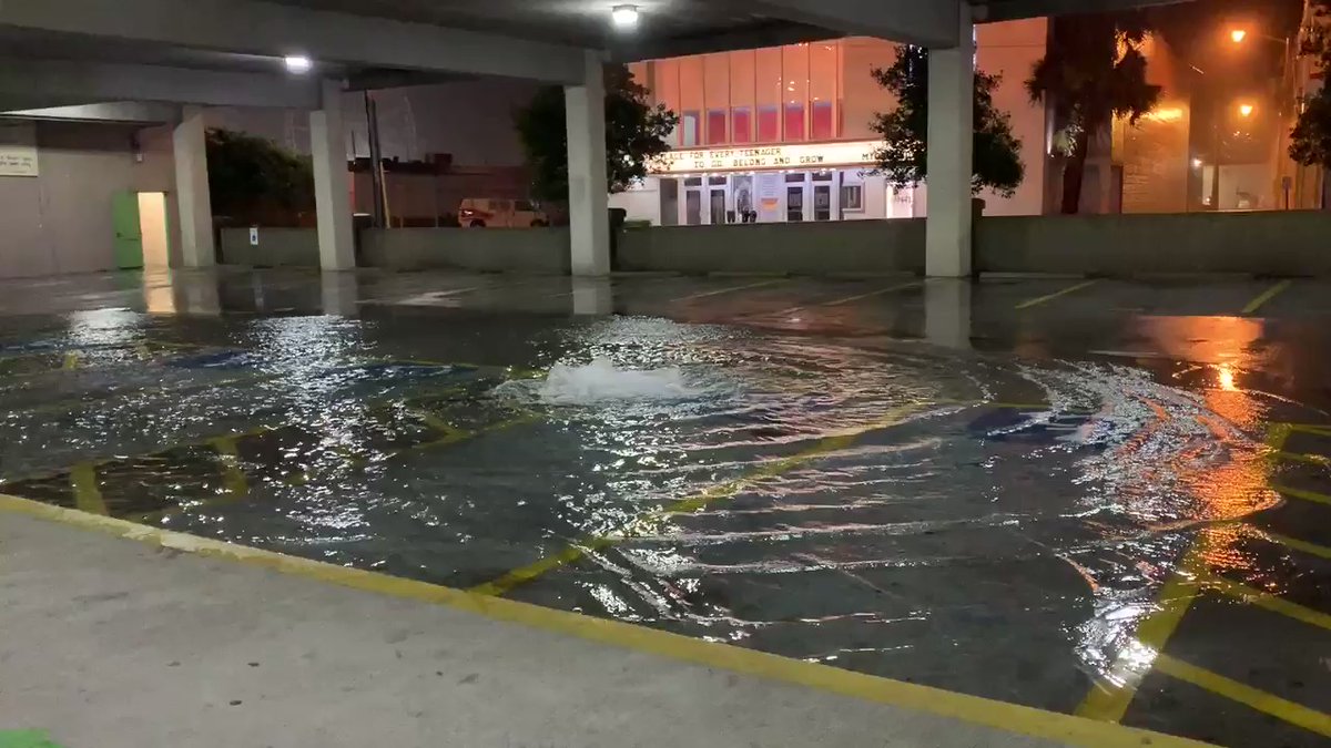 As the rain continues to hammer downtown Myrtle Beach, the parking garage next to Ripley's is beginning to flood