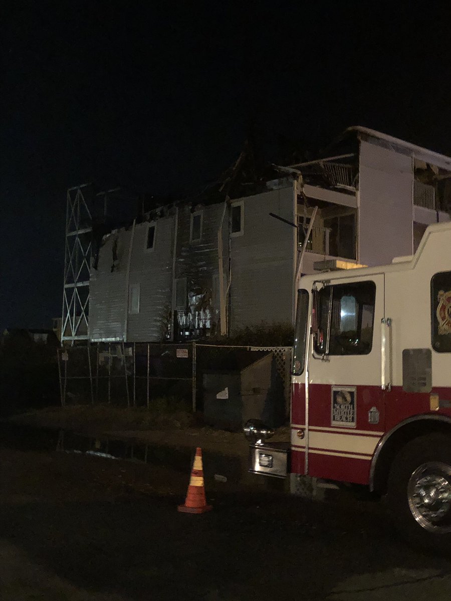 Fire crews are still on scene of a large structure fire along N. Ocean Blvd. it started around 530 last night. Several condos are completely destroyed. No sign of flames but crews monitoring hotspots