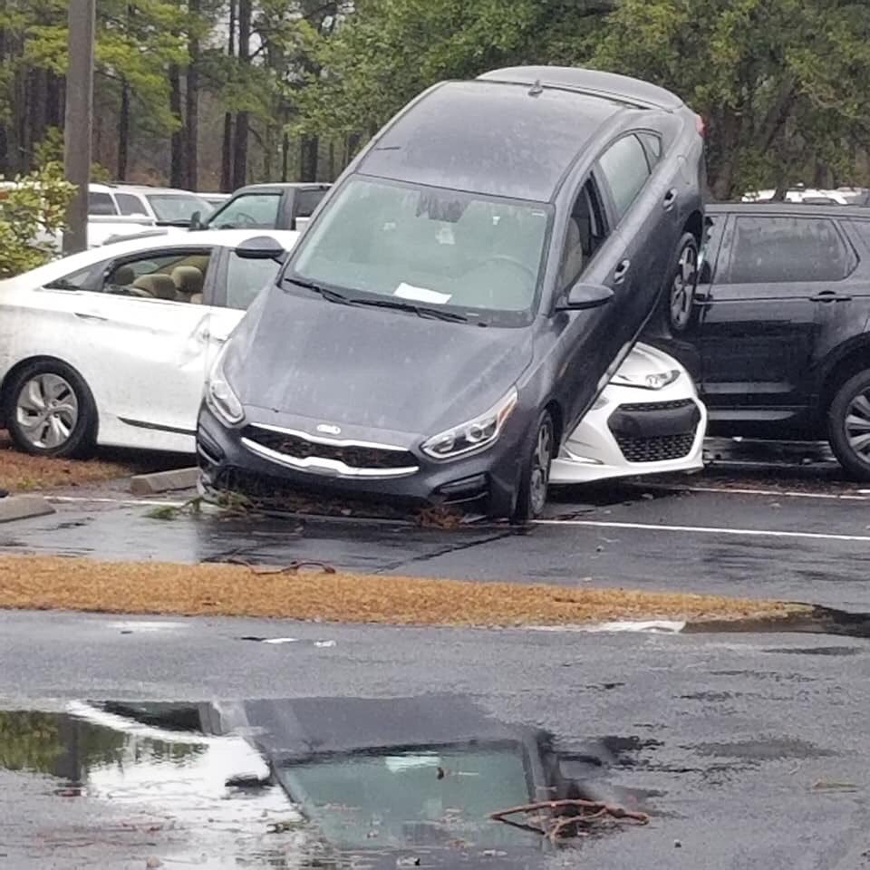 It appears a tornado touched down at Loris High School around 12:45pm this afternoon. No reports of injuries but there was significant damage to cars in the parking lot. 