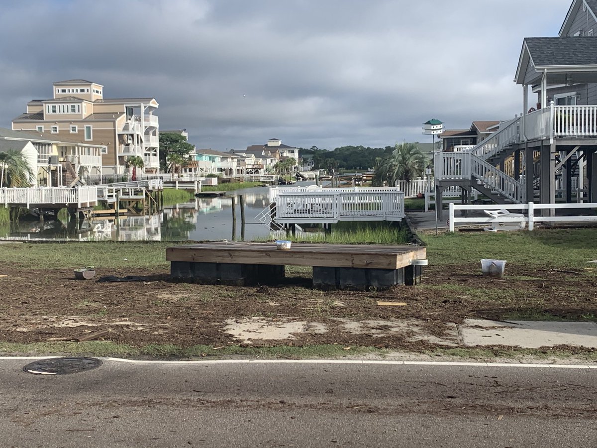 Virtually every canal in Cherry Grove has several docks that have broken lose as a result of the storm  surge.  Many were floated into yards and side streets