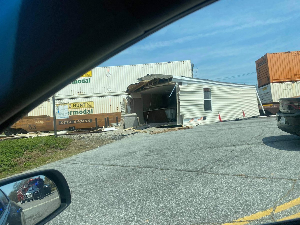 A train has hit a mobile home being transported in Liberty, SC  on Hwy 178