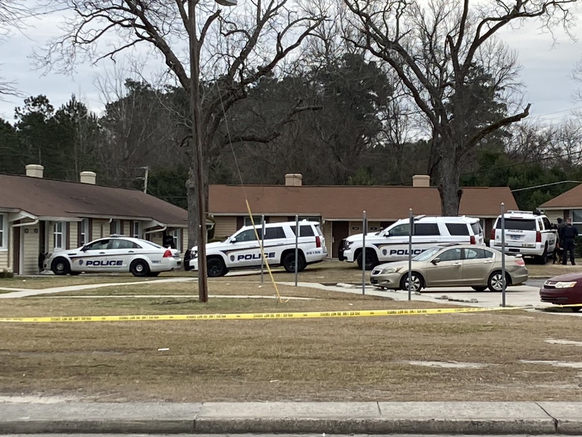 Police, SWAT team members, etc. have made their way into the apartment where the wanted male suspect is believed to be at the Colony Apartments. Shortly before this, they took a woman in a robe believed to be connected to the man into custody