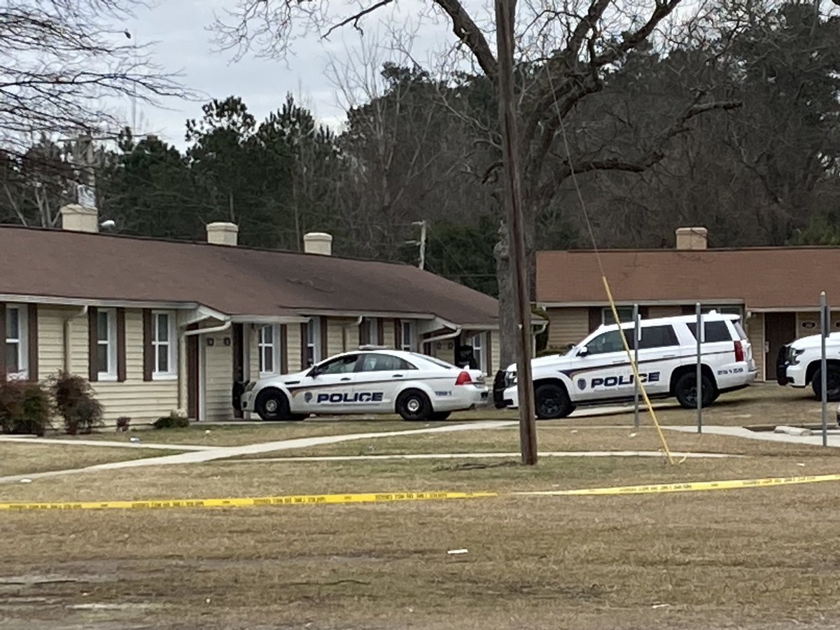 Police, SWAT team members, etc. have made their way into the apartment where the wanted male suspect is believed to be at the Colony Apartments. Shortly before this, they took a woman in a robe believed to be connected to the man into custody