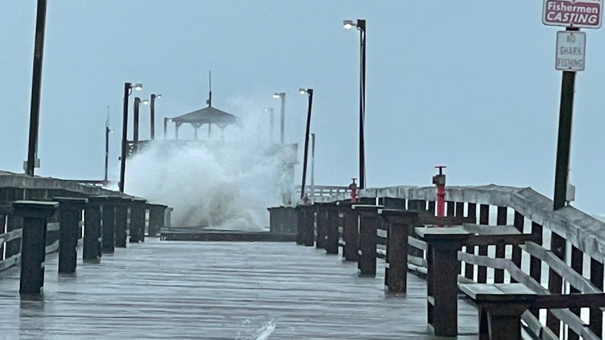 Waves crashing on Cherry Grove Pier